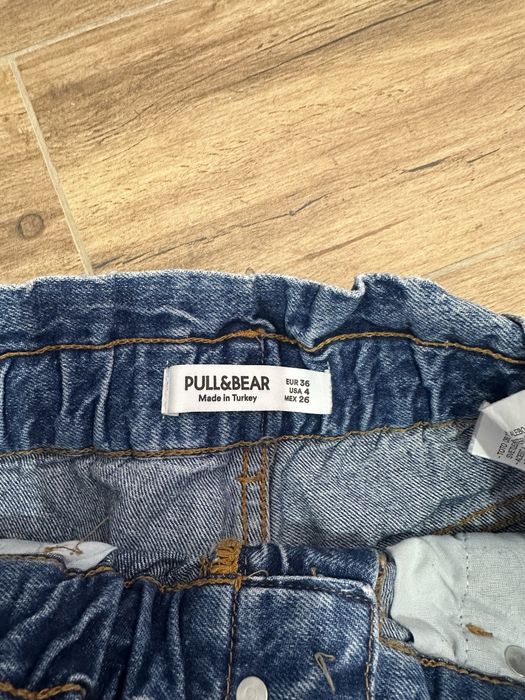 Джинси в вдкальному стані