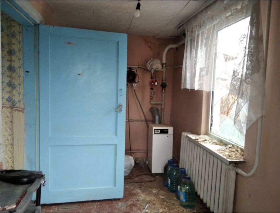 Гарний будинок в с. Мощун з земельною ділянкою 10 сот