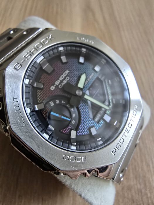 CASIO GM-2100RW-1AER G-SHOCK gwarancji na metalowej bransolecie.
