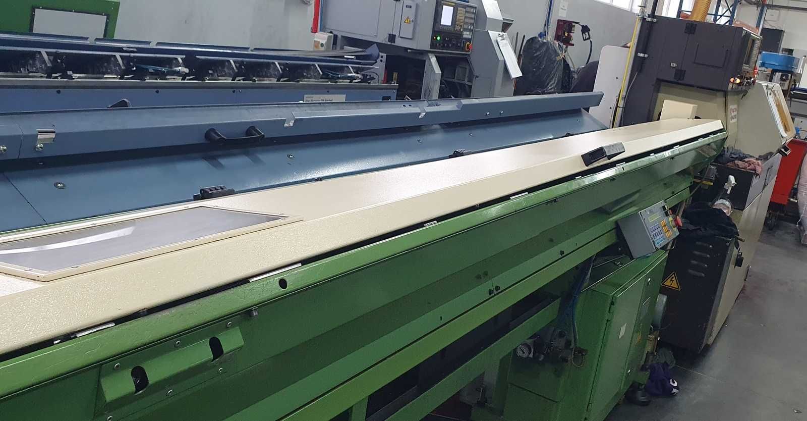 Automat tokarski typu swiss CNC STAR SR16 z podajnikiem pręta IEMCA