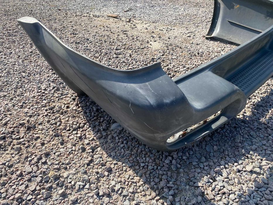 Бампер задній Nissan Terrano I