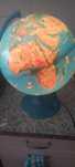 Globo terreste mapa mundo países animais criança com luz