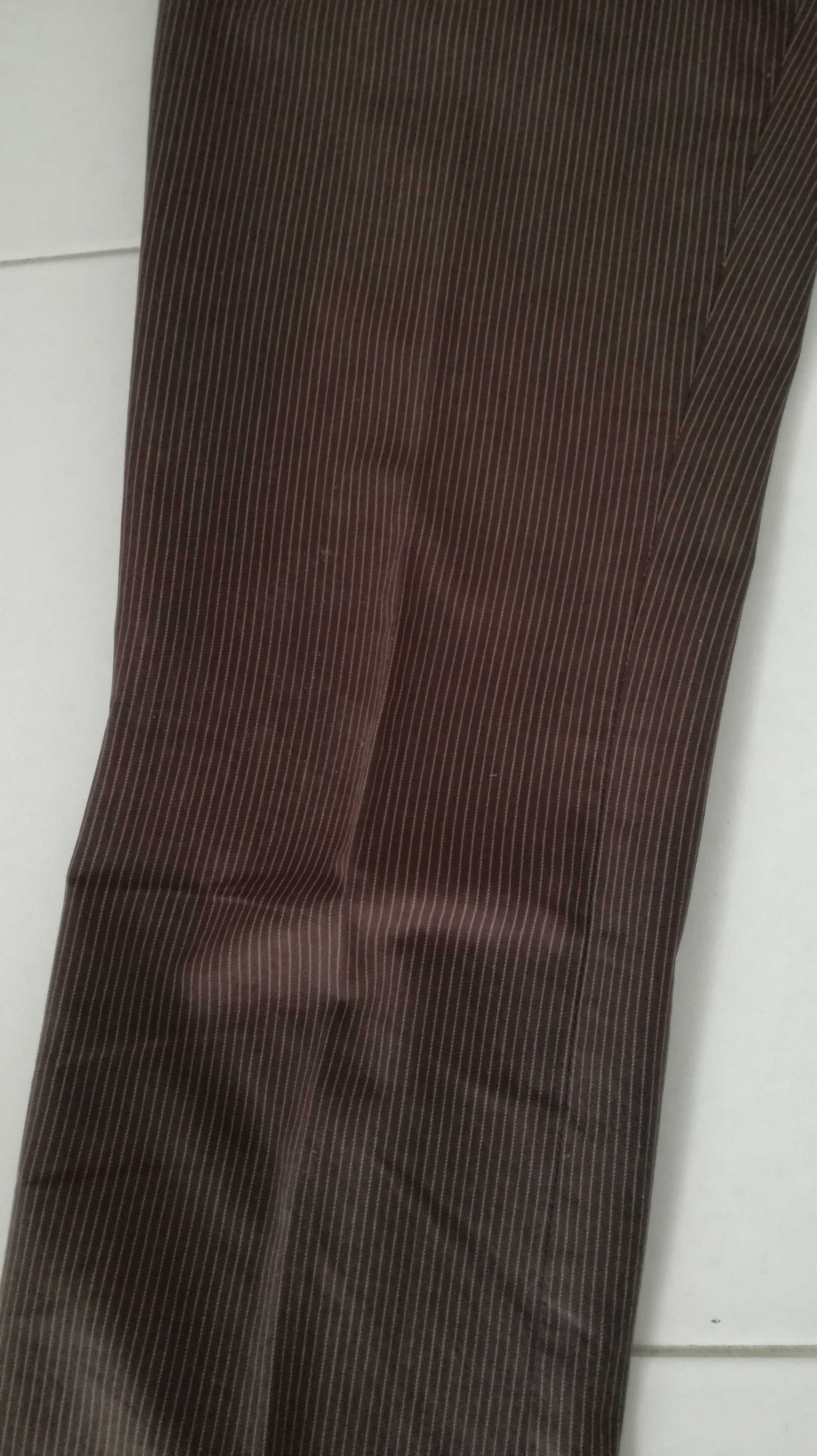 Eleganckie spodnie brązowe w drobne prążki Reserved