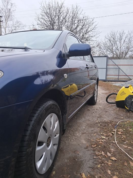 Тойота корола е120