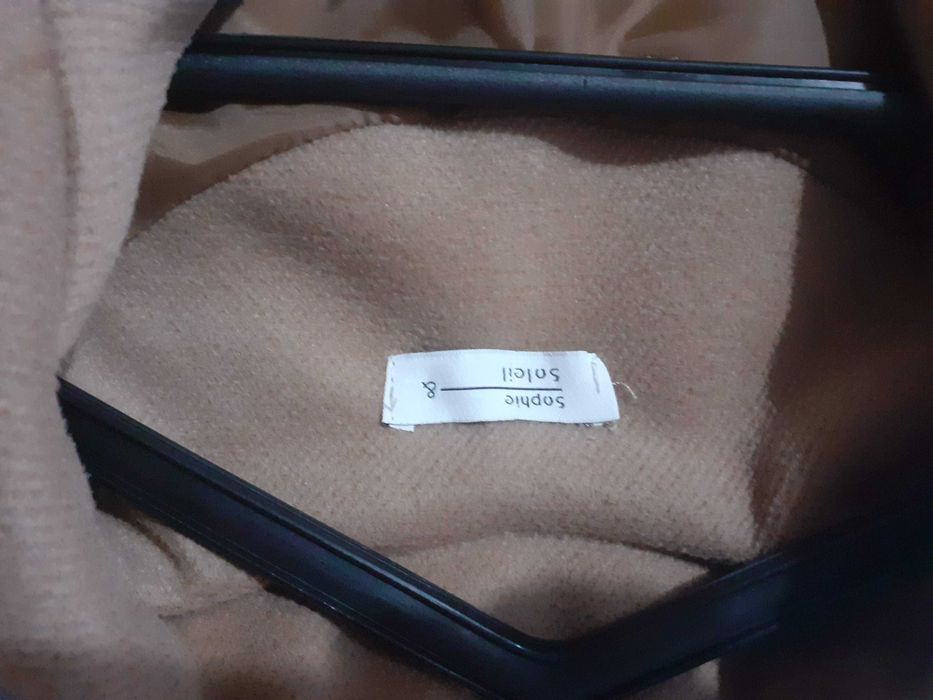 Casaco comprido de senhora