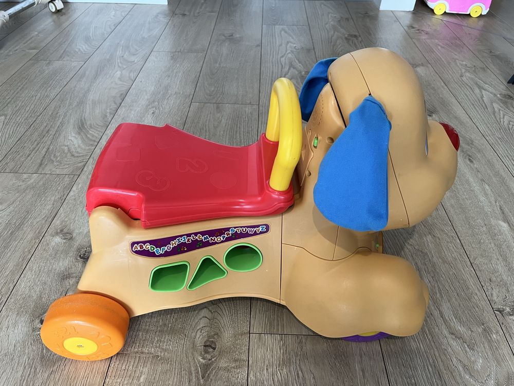 Jeździk pchacz Fisher Price Piesek sprawny