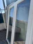 Porta de abrir com oscilobatente  em Pvc Branco L-1500 A-1900