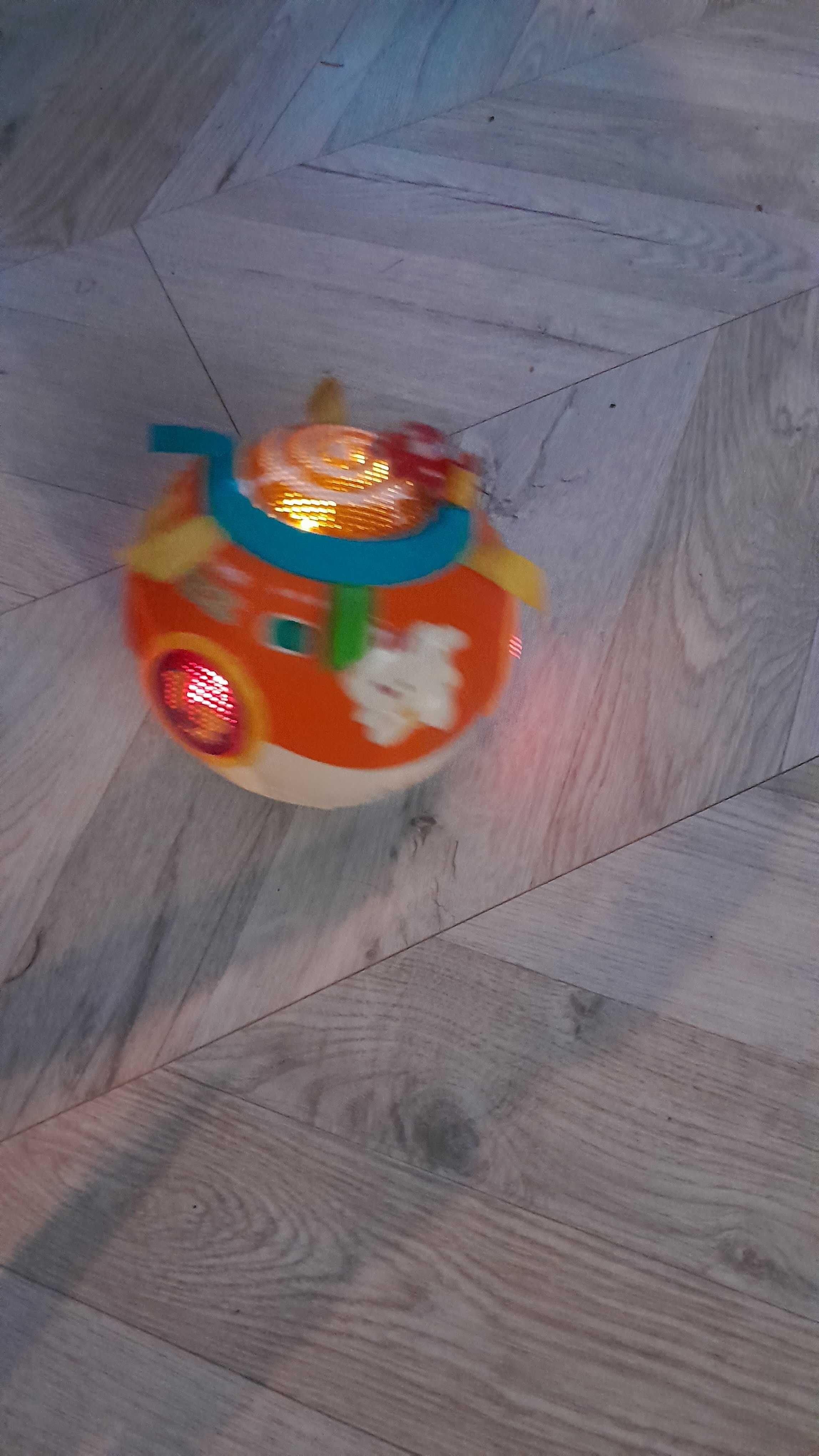 Migocząca Hula-Kula V-tech, zabawka interaktywna światło i dźwięk