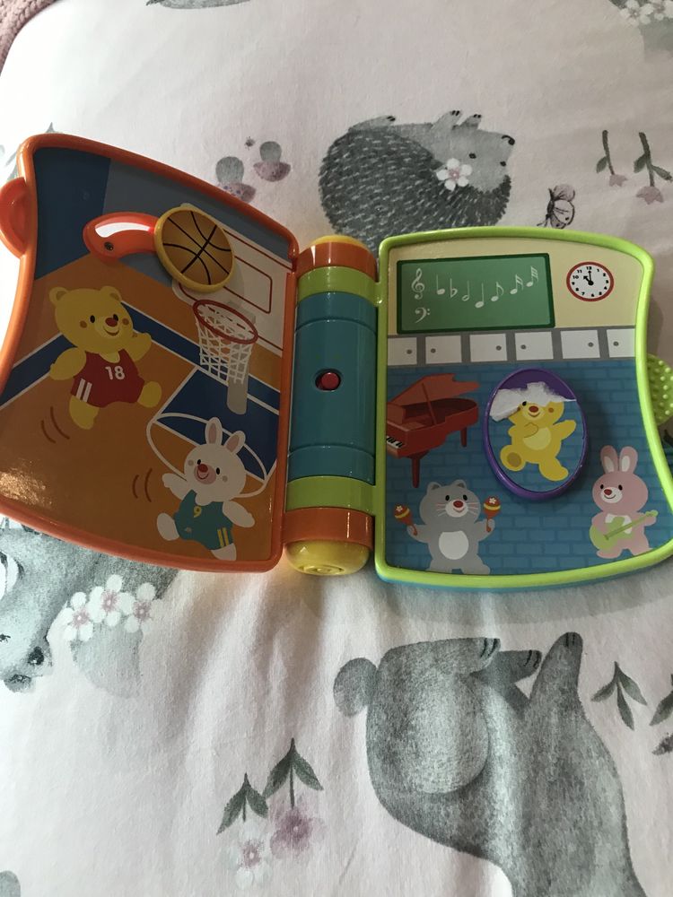 Brinquedo livro interativo com som