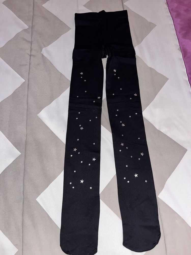 Collants pretas com estrelas