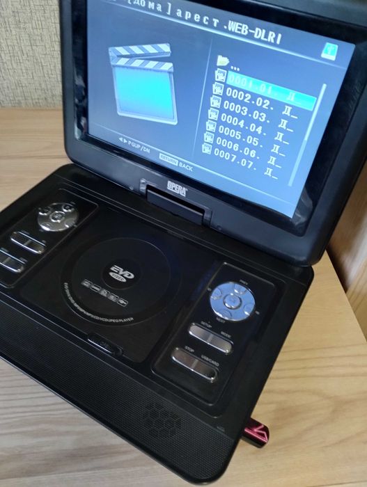 Продам  портативный ДВД