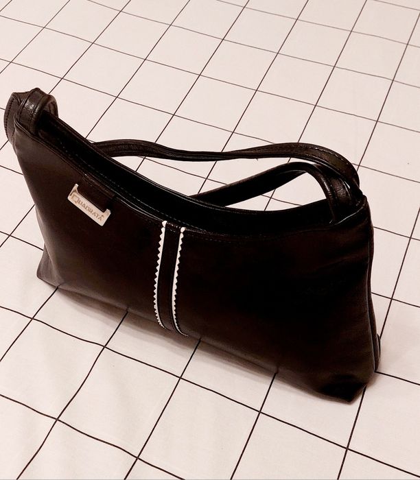 Bolsa preta marca Quadrata