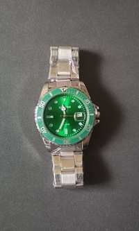 Srebrny klasyczny męski zegarek z zieloną tarczą