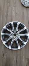 Nowa oryginalna felga Mazda 18"