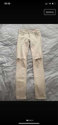Spodnie jeansy beżowe lato rurki rozcięcia dziury hello miss 38 nowe