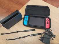 Nintendo Switch 1 com comandos e saco de transporte