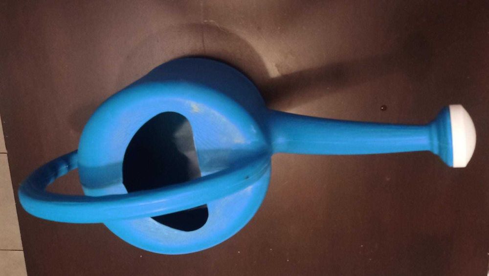 Regador de plástico