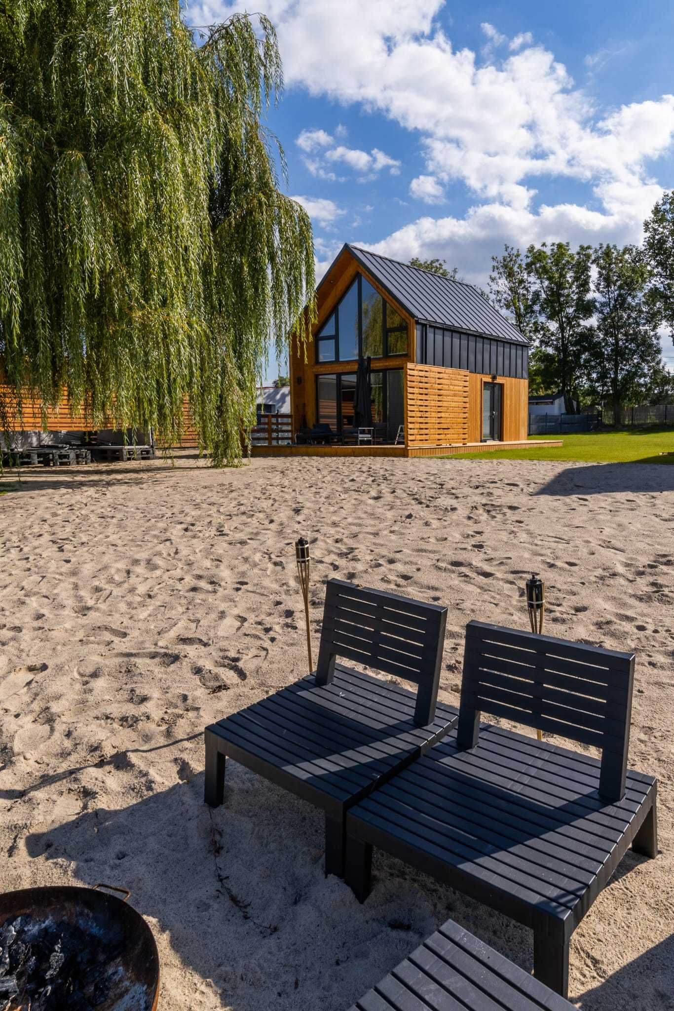 Domek Domki  Kunice  z własnym Jakuzzi  nad jeziorem prywatna plaża