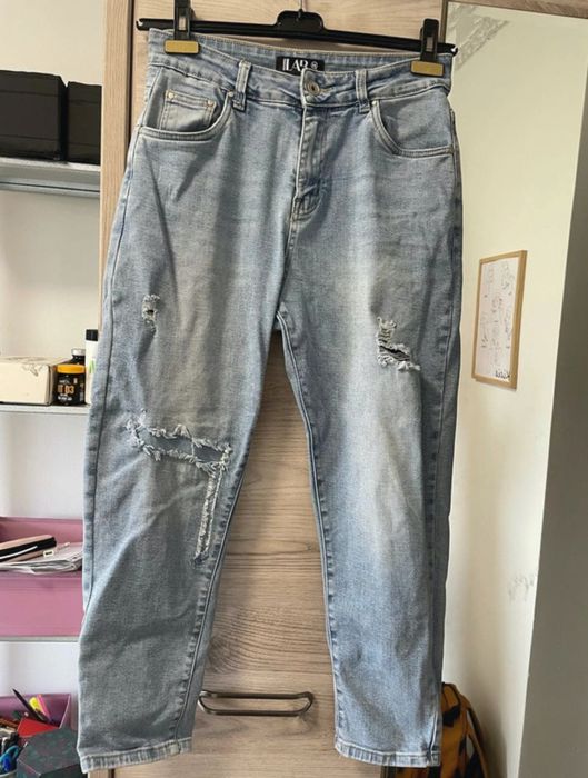 Jeansy z przetarciami damskie