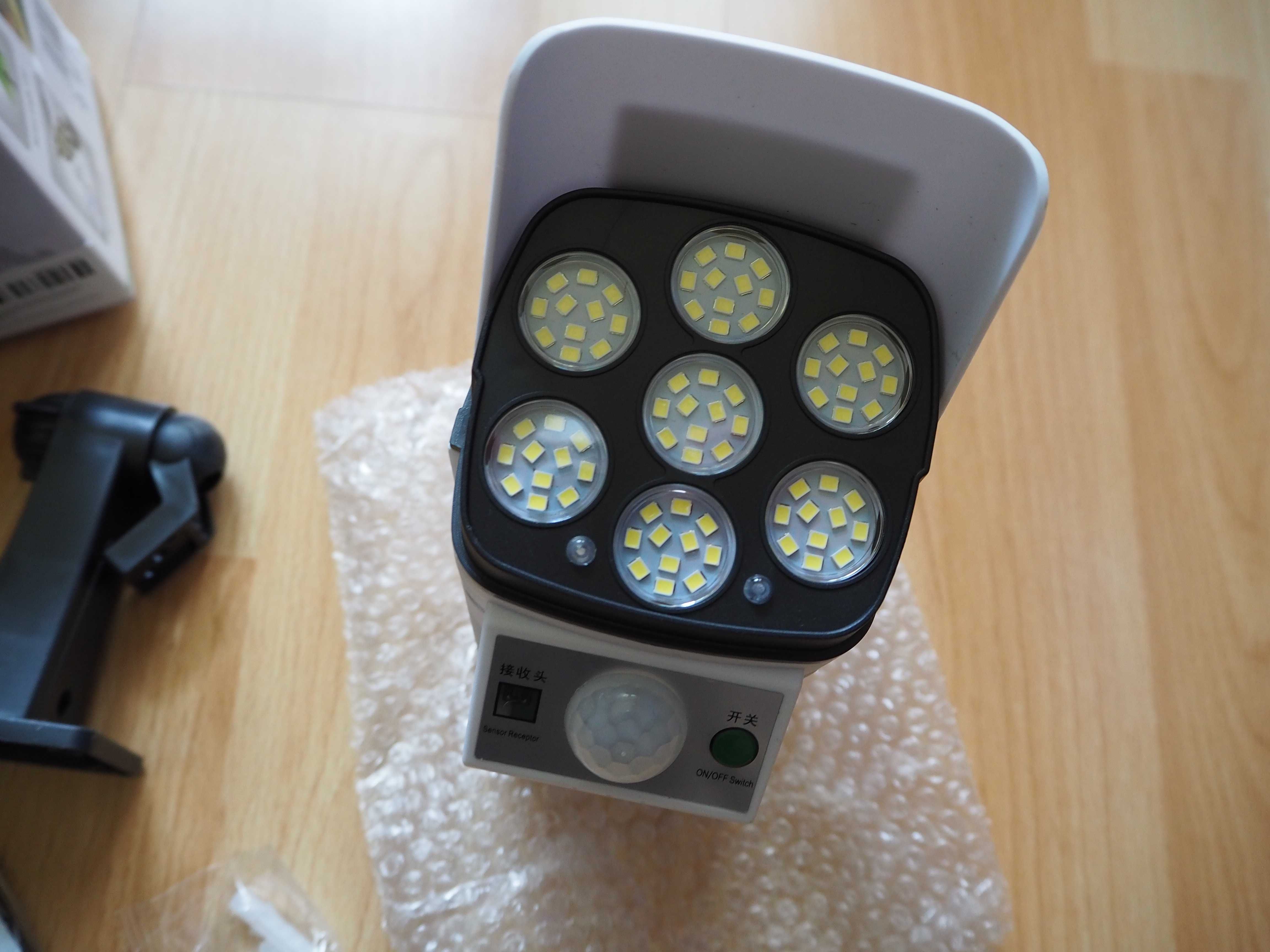 Lampa panel słoneczny - czujnik ruchu / zmierzchu - pilot 77 led NOWA