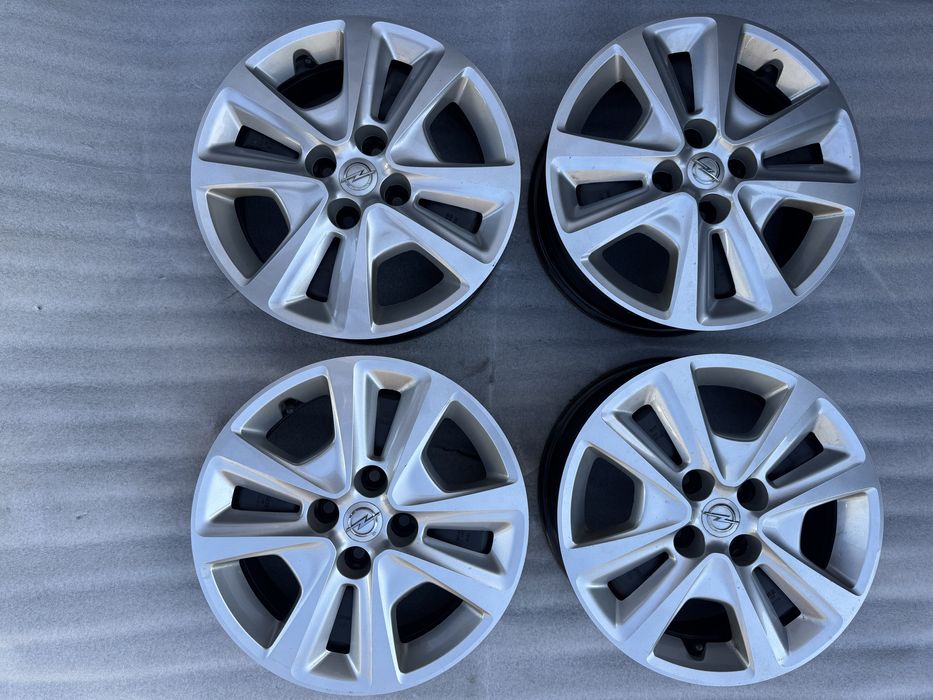 Felgi opel 6x15 ET 39 4x100 czyjniki cisnienia + kołpaki