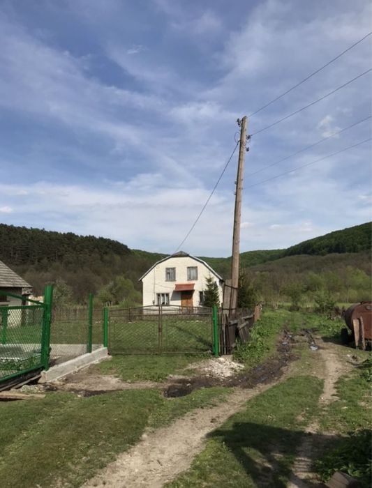 Продам будинок та земельну ділянку (разом з альтанкою та ставом)