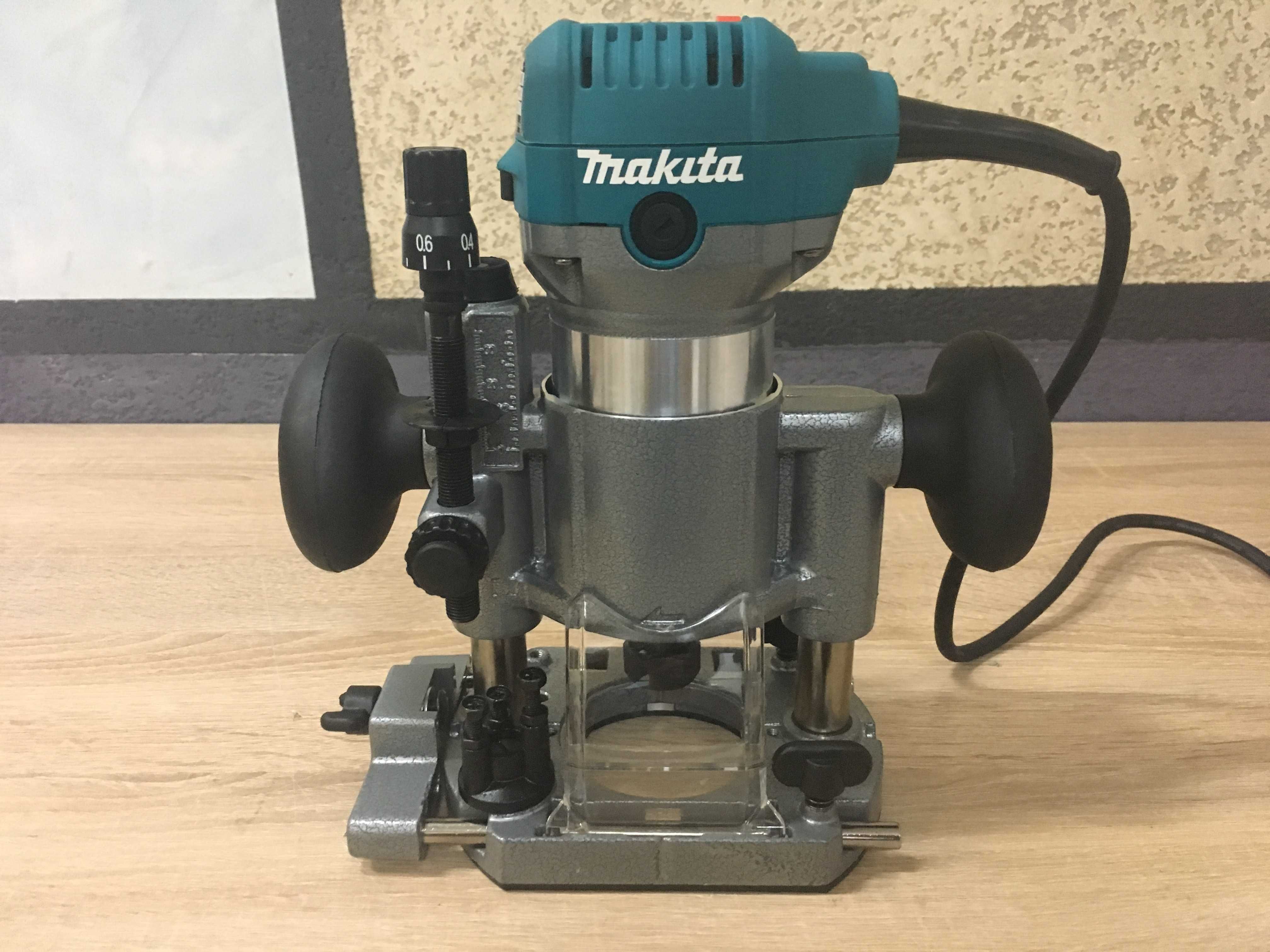 Фрезер Makita RT0700C 6-8мм (2/3/4 базы в комплекте)