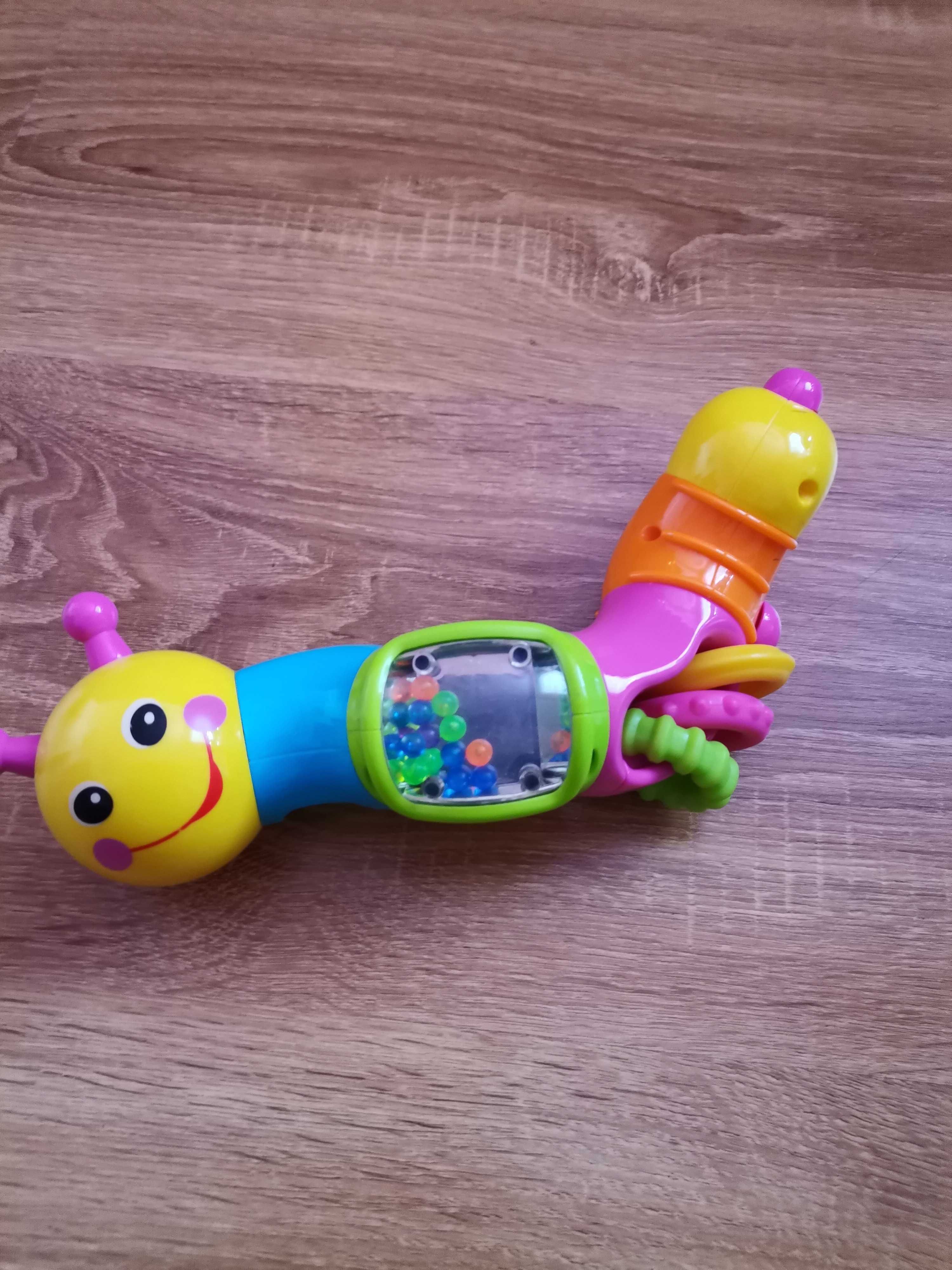 Дитяча іграшка -  розвиваюча багатофункціональна гусениця-тріскачка