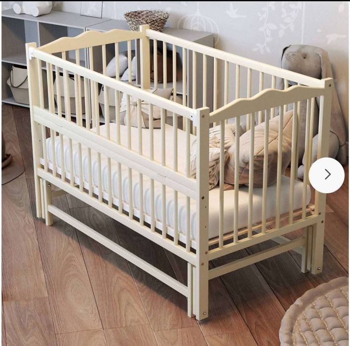 Дитяче ліжечко з маятником.Новий матрасик