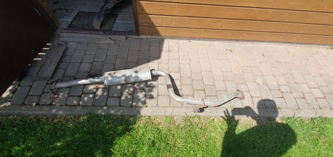 Tłumnik do mitsubishi carisma i błotnik
