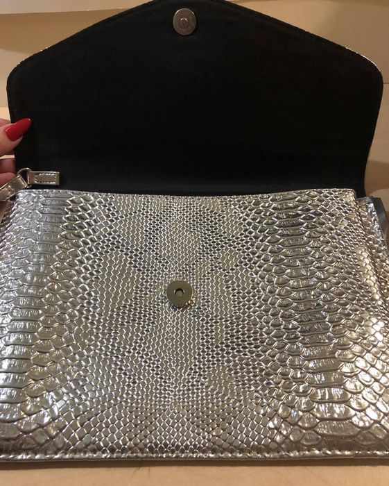 Новый серебристый клатч.Сумка.