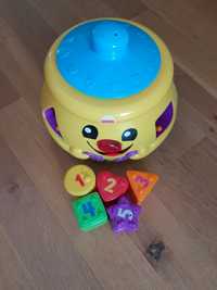 Garnuszek na klocuszek fisher price