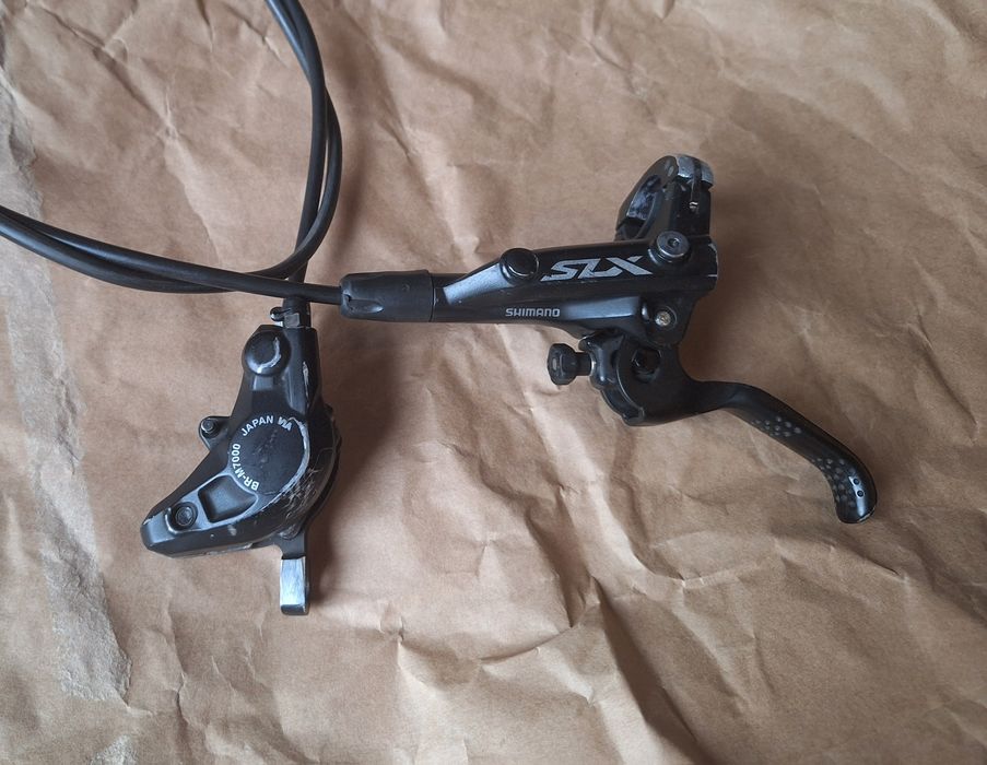 Hamulec shimano m7000 przód lewy