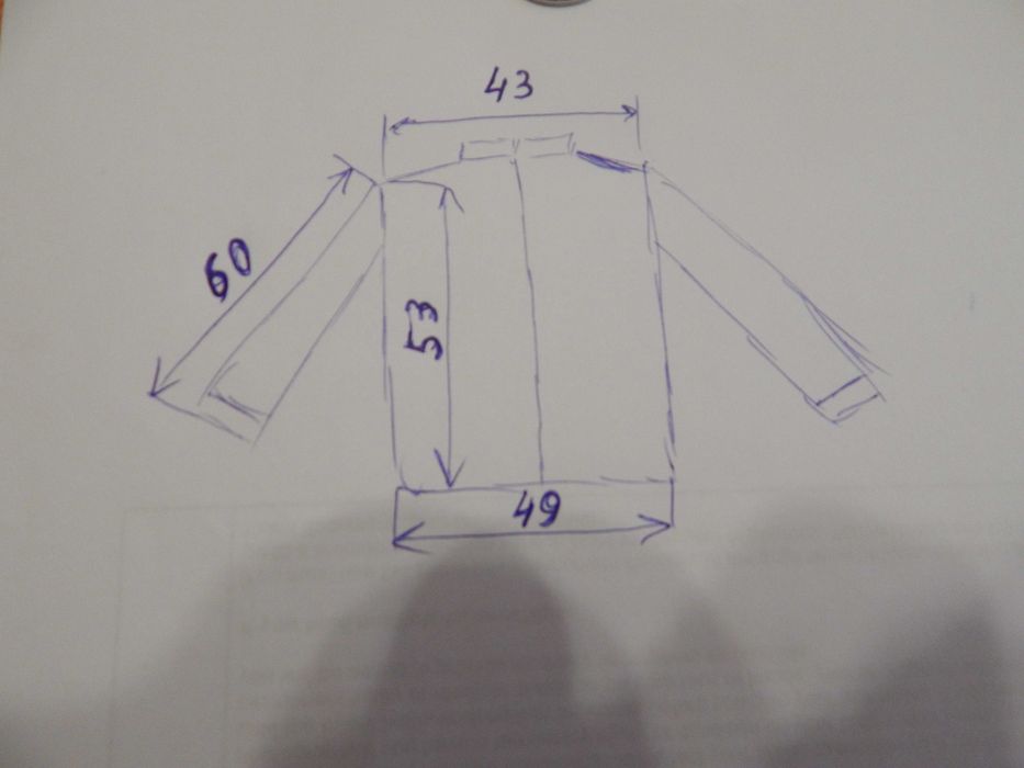 Продам женскую ветровку.