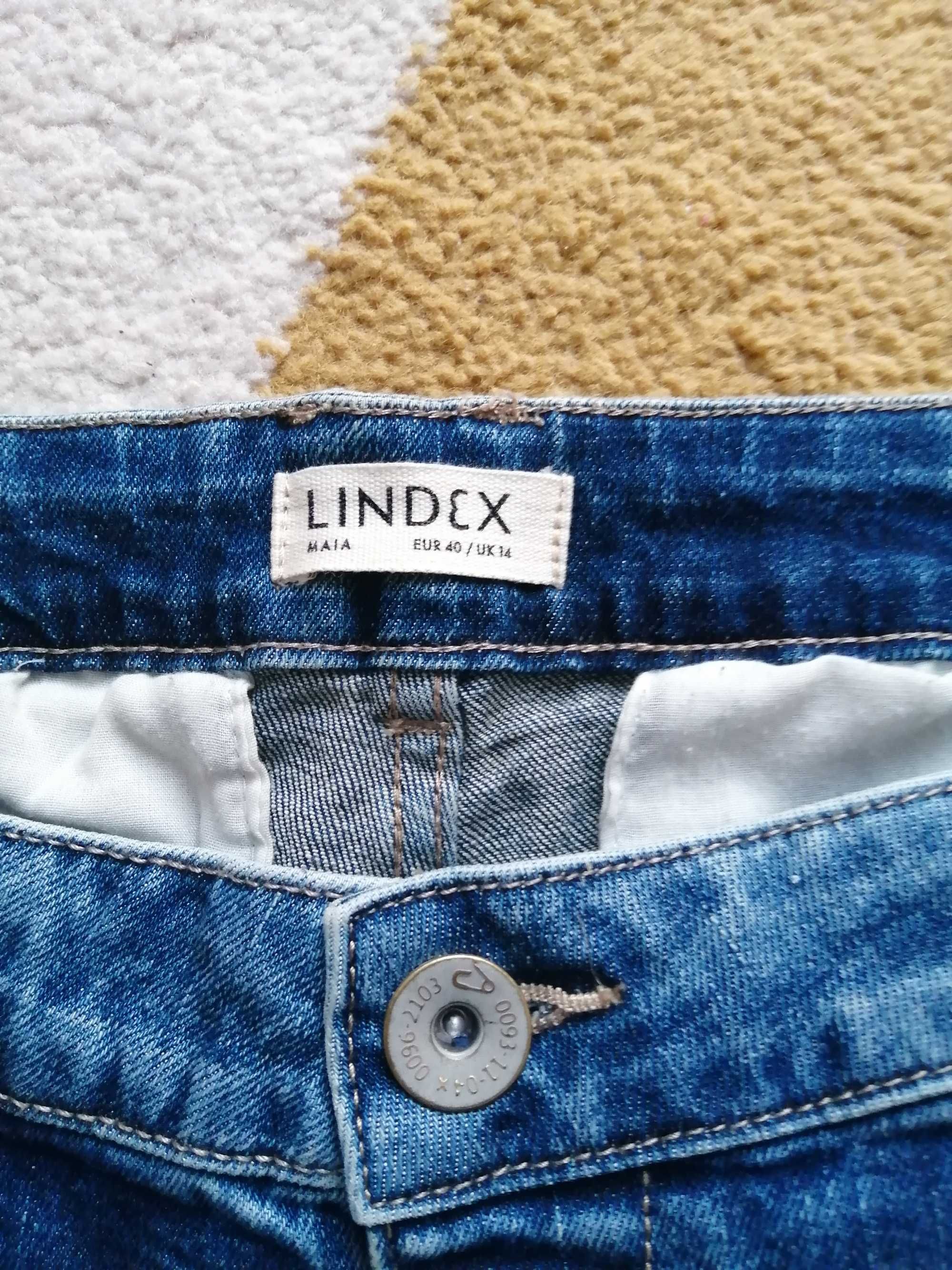 Spodnie jeansowe haftowane 40
