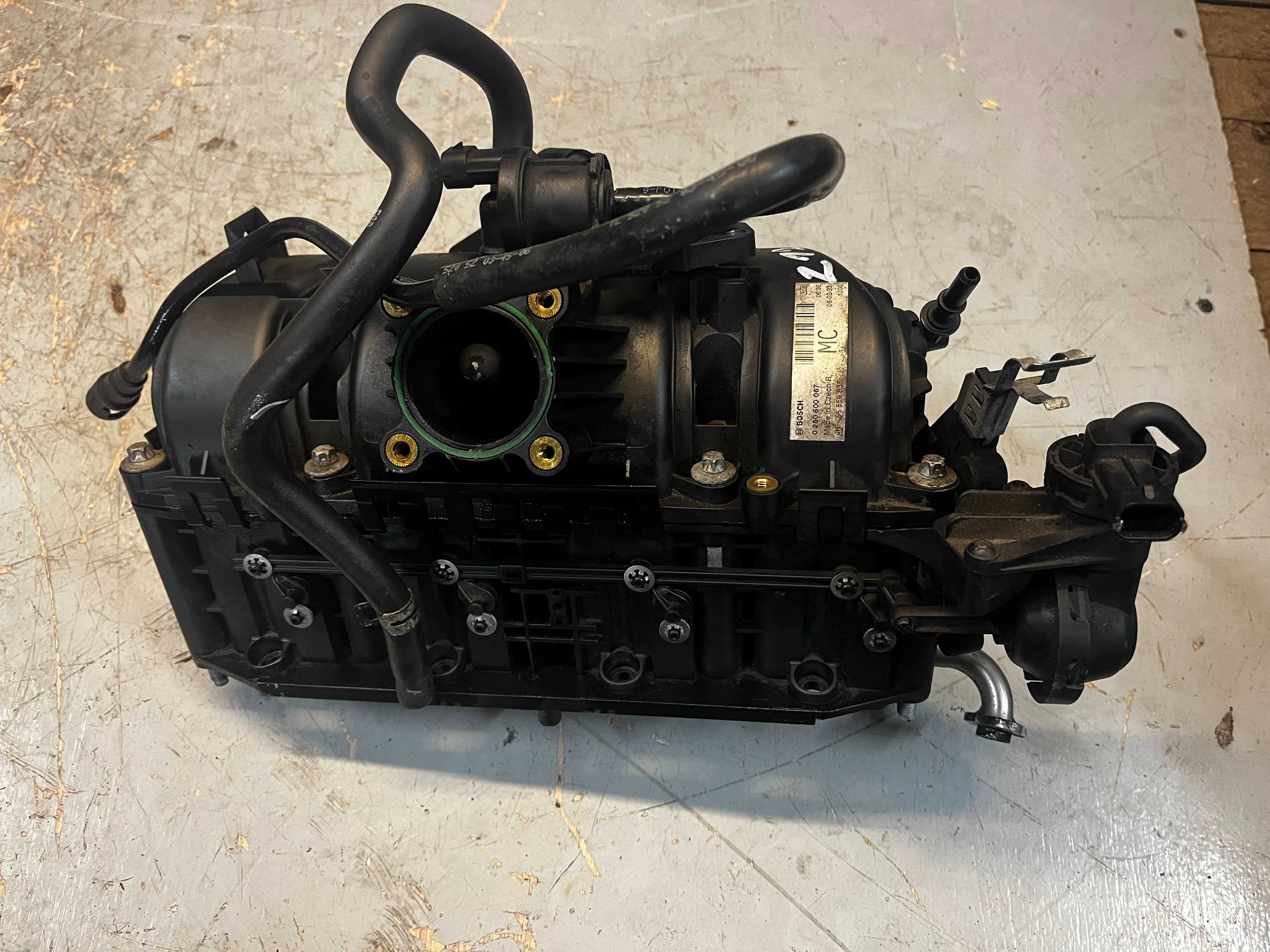 992D Kolektor Ssący Opel Corsa D 1.2B Z12XEP Stan BDB