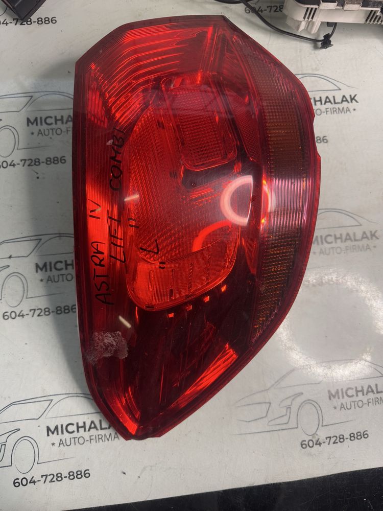 Opel Astra J IV kombi Lampa lewa tylna