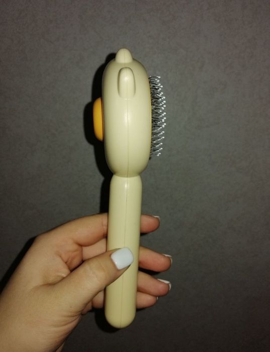 Пуходерка с кнопкой для вычесывания