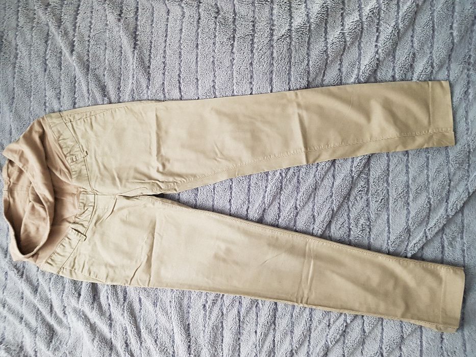 Musztardowe spodnie ciążowe r.34 H&M