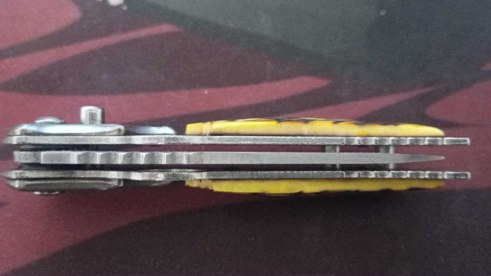 Nóż składany sprężynowy