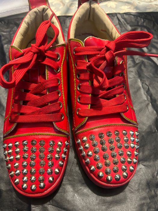 Ténis Louboutin vermelhos