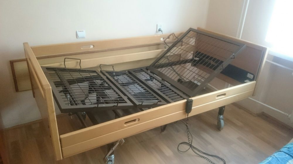 Łóżko rehabilitacyjne na pilota - elektryczne 2 funkcje transport