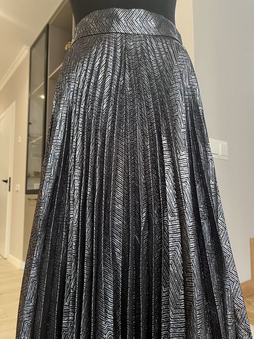 Спідниця міді з плесіровкою