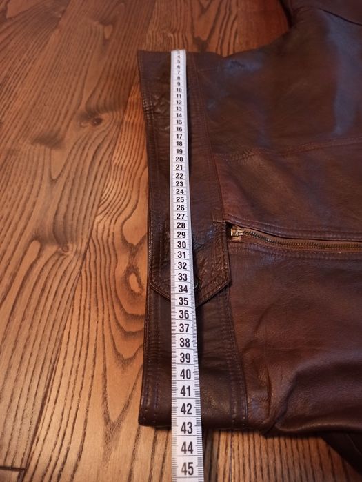 Кожаная куртка - размер 50, кожаная юбка - размер 52