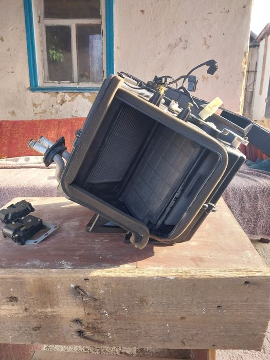 Обігрівач салону та радіатор пічки Кіа Соренто 1