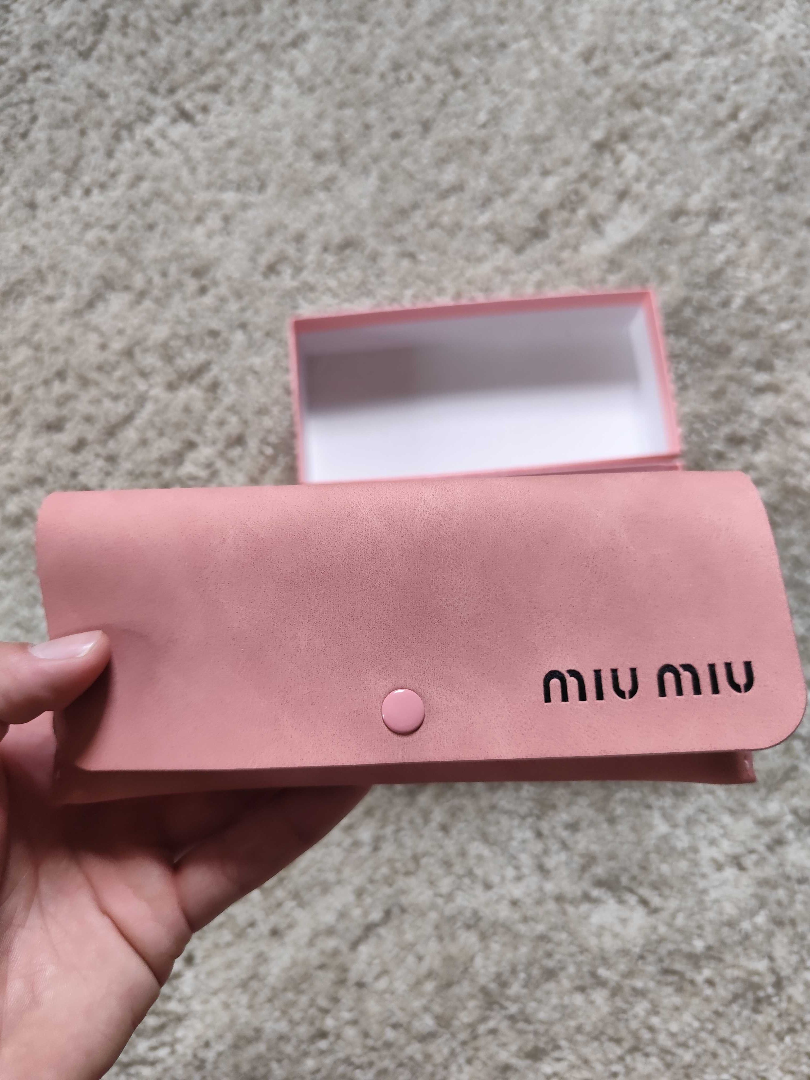 Oculos Miu Miu brancos