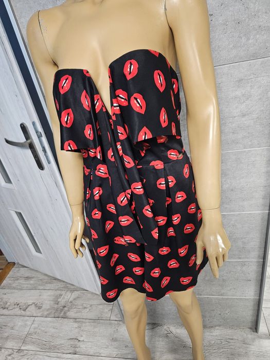 Kombinezon na lato elegancki Guess rozm M w usta
