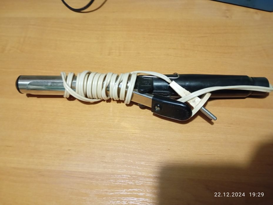 Утюжок та плойка