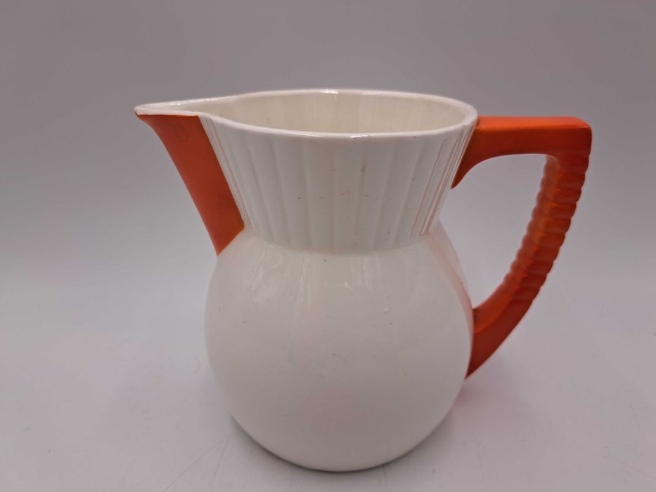 Stary dzbanek porcelana Max Roesler biały pomarańczowe ucho i dziubek