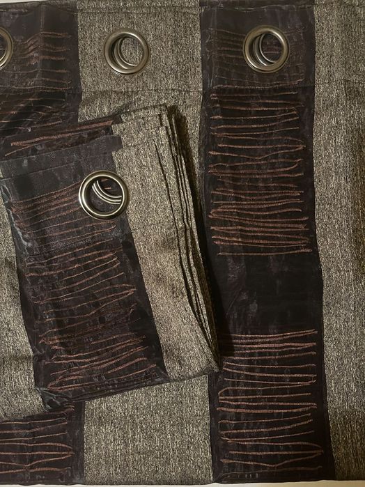 CORTINADOS de argolas castanhos com transparência